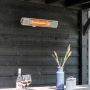 Sfeerbeeld hangende Eurom Heat and Beat Wit terrasverwarmer - 2000W